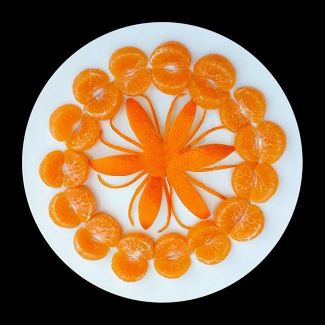 Cách trình bày đĩa cam bóc múi vỏ